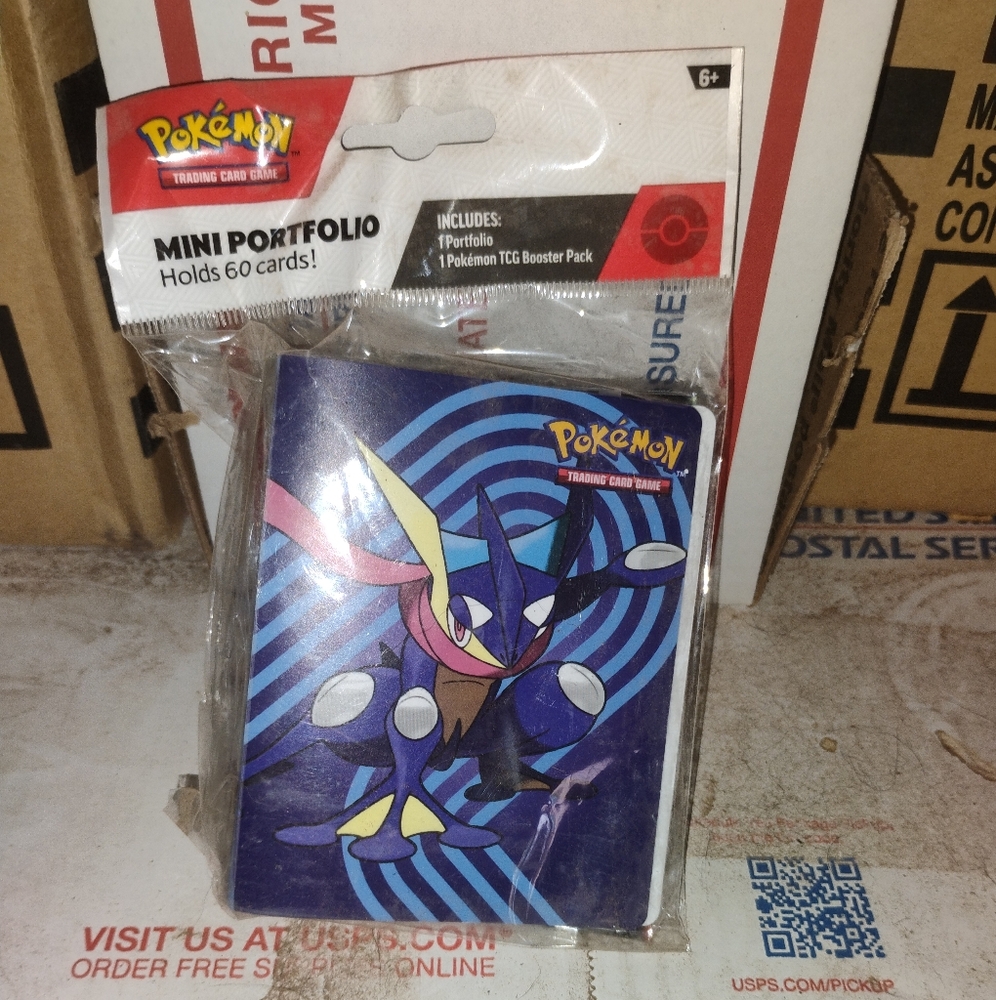 Pokemon TCG Mini Portfolio With Scarlet And Violet Stellar Crown Booster Pack